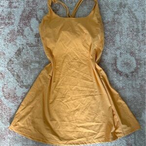 Women’s athletic dress, light orange
